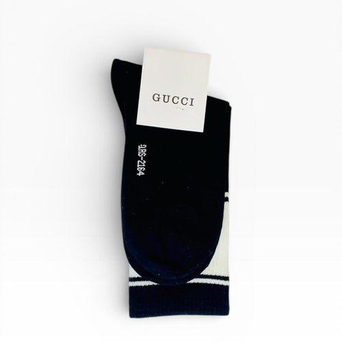 Gucci GG Logo Cotton-Blend Socks in Black and White