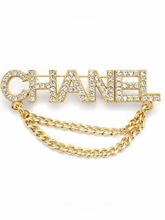 CHANEL Gold and Clear Crystal Draped Chain Brooch - Sable & Red
