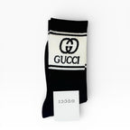 Gucci GG Logo Cotton-Blend Socks in Black and White