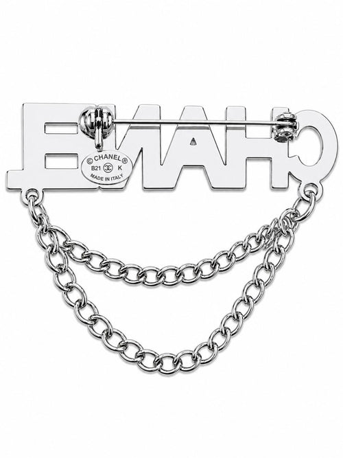 CHANEL Silver Crystal Logo Double Chain Brooch