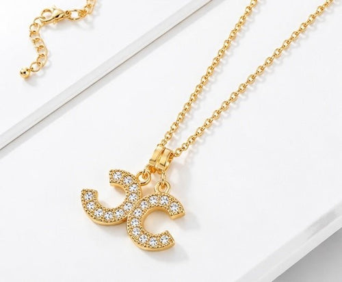 Gold Double CC Crystal Pendant Necklace 18” Chain - Sable & Red