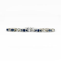 Oval Lab-Created Blue Sapphire Double Infinity Bracelet in Silver - Sable & Red